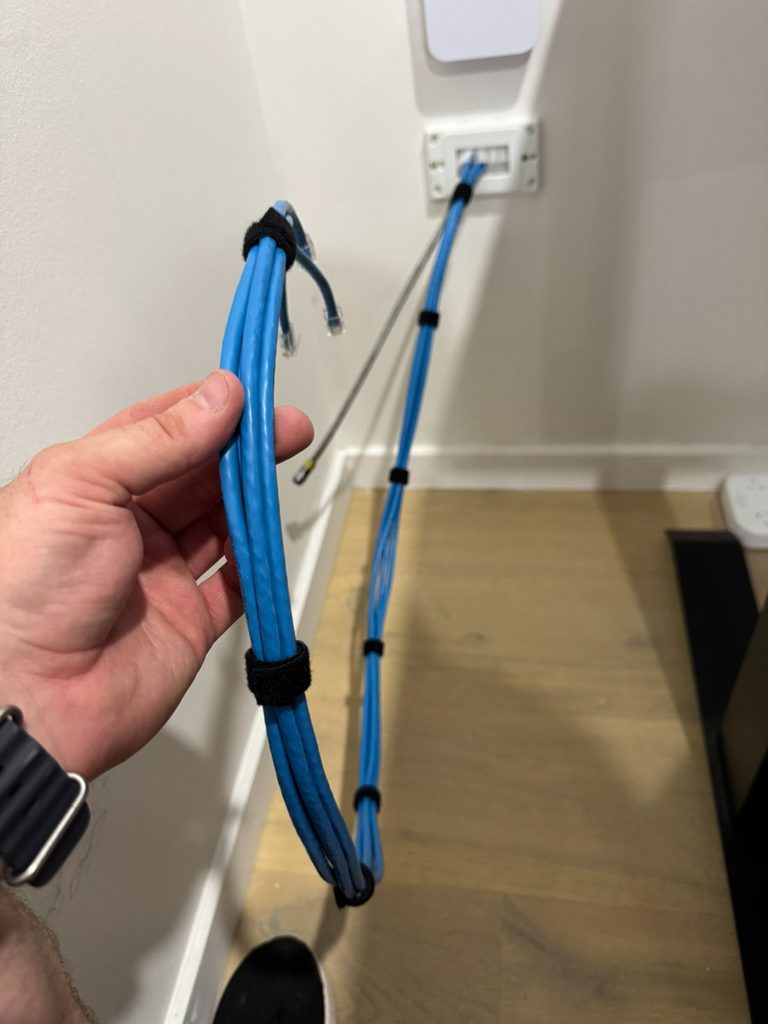 Professional Cat6 cable installation with velcro cable management - Brisbane data cabling work in progress