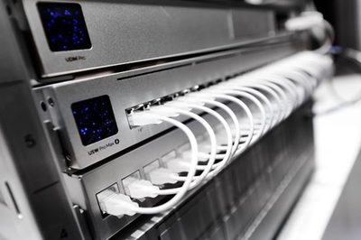 UniFi UDM Pro and USW Pro Max rack with certified patch cables - Brisbane comms room installation