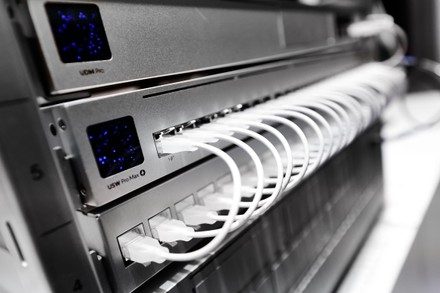 Digital signage Brisbane — network infrastructure driving commercial display screens by UNS