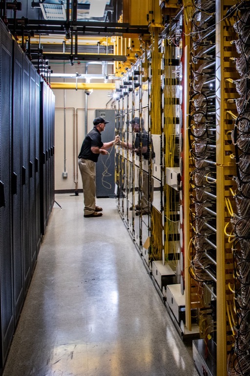 Distribution frames with certified cabling documented in a Brisbane certification report