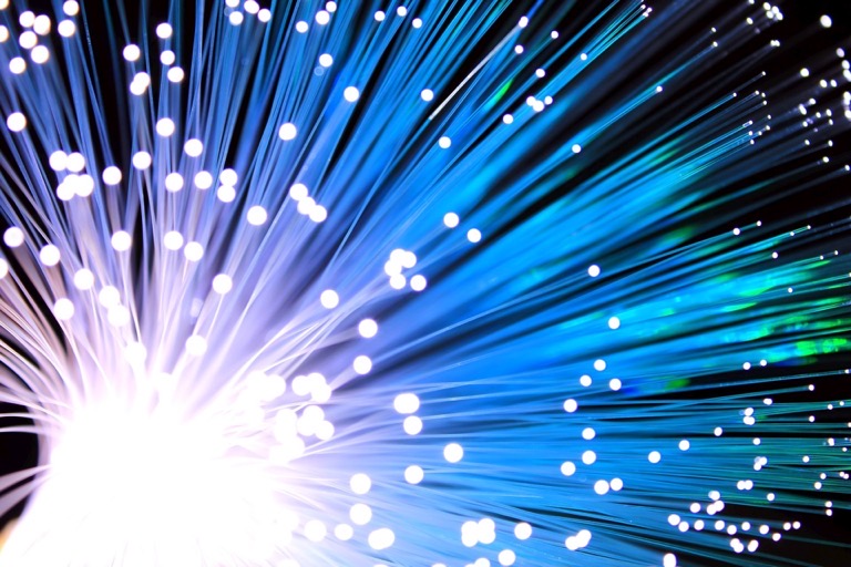 Illuminated fibre optic cable strands carrying light – fibre optic cabling Brisbane